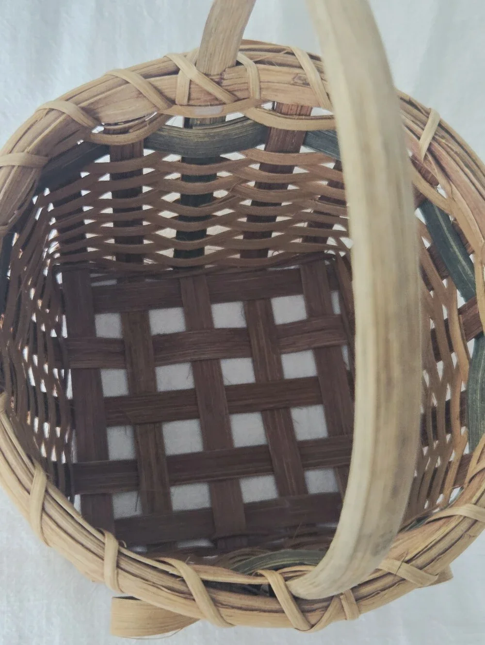Vintage, Hand-Woven Basket Featuring A Unique Bow Detail And Green Accent